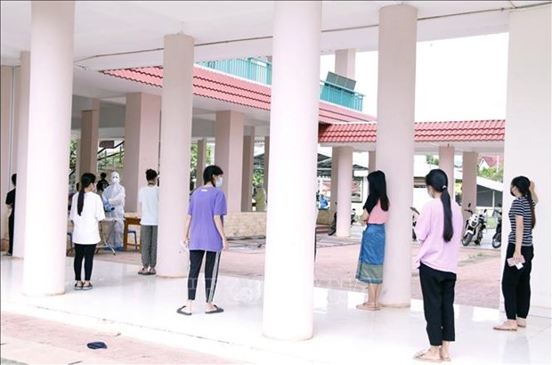 Vietnamese in Laos join hands in COVID-19 fight